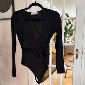 Elegant Black Ribbed Bodysuit by Florence